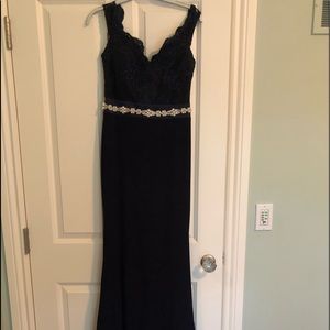 Navy gown with sequin top and lace train